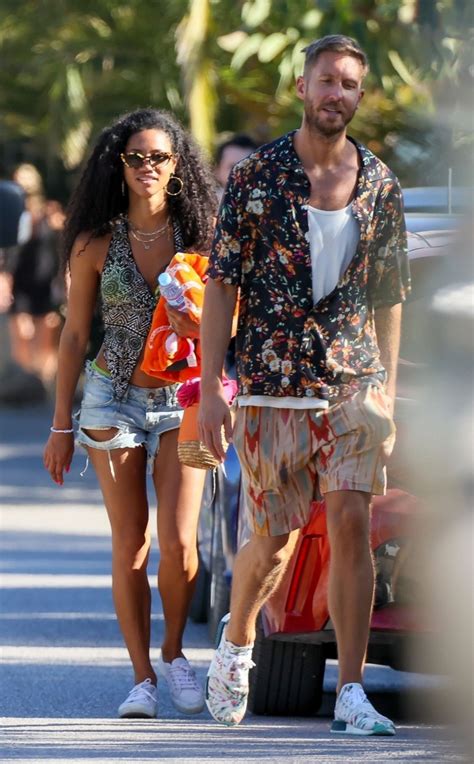 Vick Hope topless on beach with Calvin Harris after。